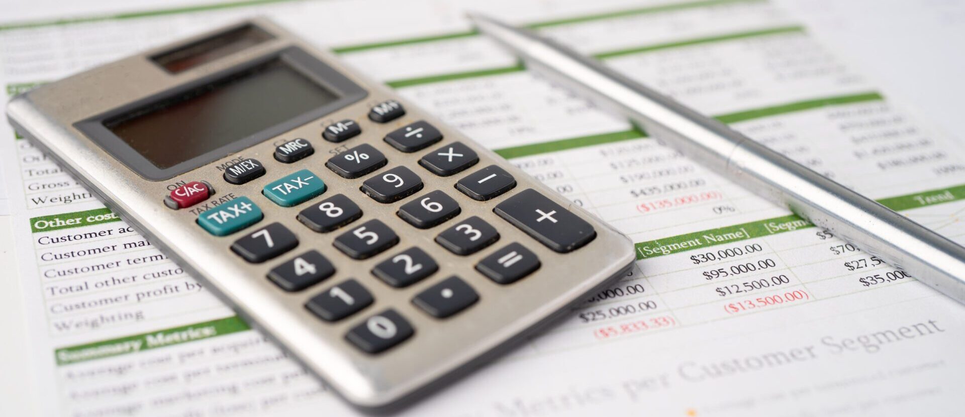 Calculator on graph paper. Finance development, Banking Account,